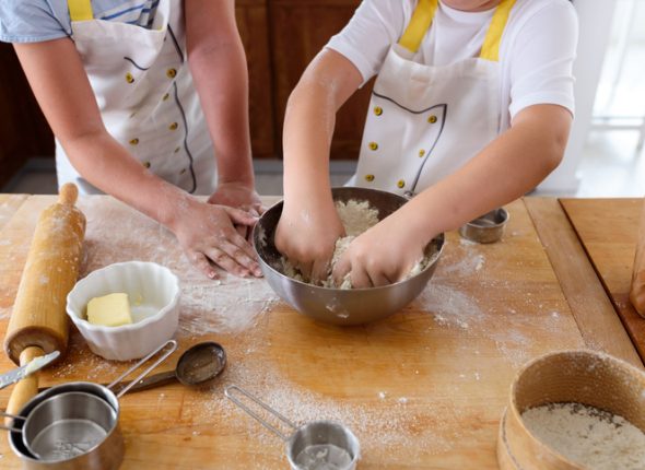 Kids Helping in the Kitchen. Brother and sister baking.